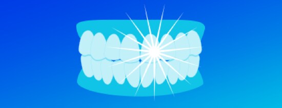An illustration of top and bottom teeth, closed and sparkling.
