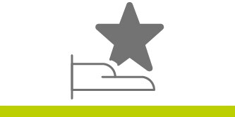 Icon of a hand laying flat with index finger extended and a star above it.
