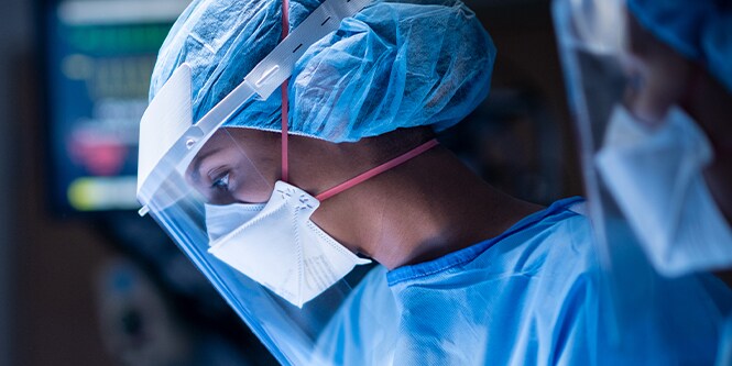 Clinician wearing PPE
