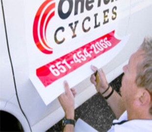 changeable graphic wrap film for fleet vehicles