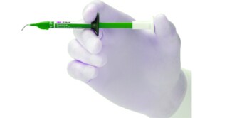 hand holding syringe
