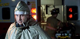 person wearing a CBRN respirator
