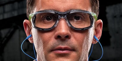 Man wearing safety glasses with gaskets

