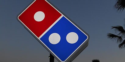 Domino's pizza illuminated sign wrapped in 3M printable, colored, translucent film
